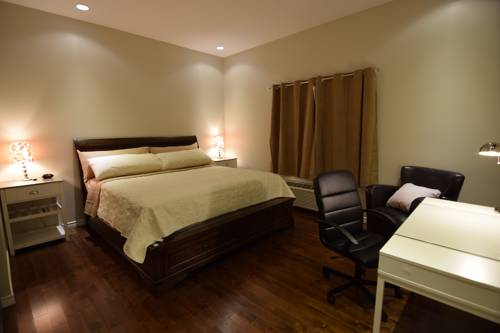 Imagen de la habitación del Hotel The Lion Inn and Suites. Foto 10
