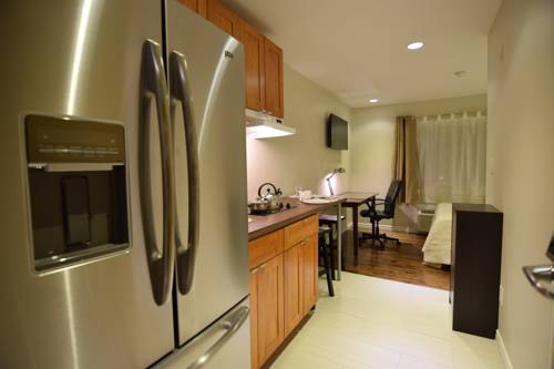Imagen de la habitación del Hotel The Lion Inn and Suites. Foto 11