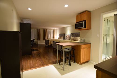 Imagen de la habitación del Hotel The Lion Inn and Suites. Foto 14