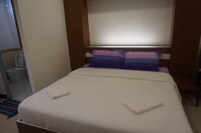 Imagen de la habitación del Hotel The Lion Residence. Foto 8