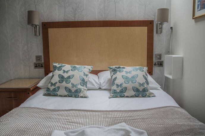 Imagen de la habitación del Hotel The Lion and The Lamb. Foto 16