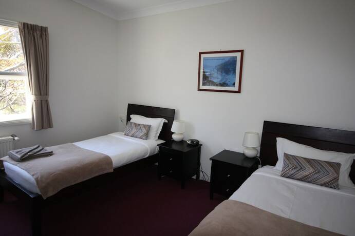 Imagen de la habitación del Hotel The Lions Lair. Foto 23