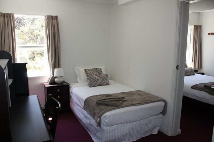 Imagen de la habitación del Hotel The Lions Lair. Foto 25