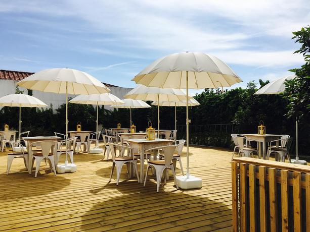 Imagen de los exteriores del Hotel The Literary Man. Foto 11