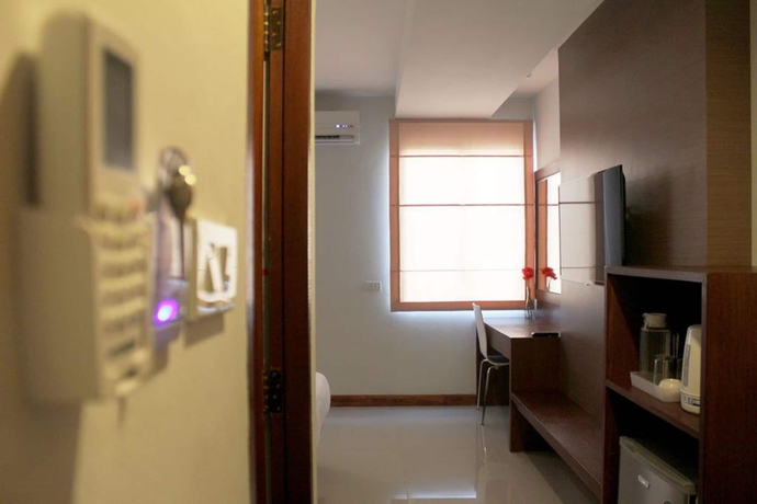 Imagen de la habitación del Hotel The Little Nest. Foto 9