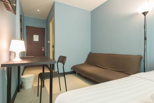 Imagen de la habitación del Hotel The Little Pig Sukhumvit. Foto 3