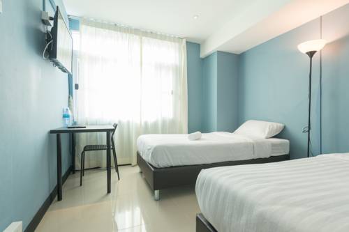 Imagen de la habitación del Hotel The Little Pig Sukhumvit. Foto 6
