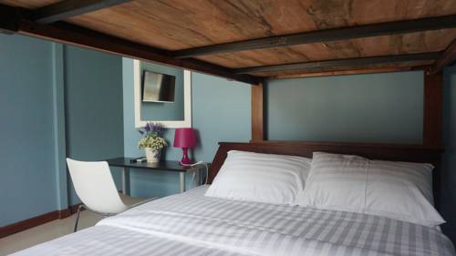 Imagen de la habitación del Hotel The Little Pig Sukhumvit. Foto 12