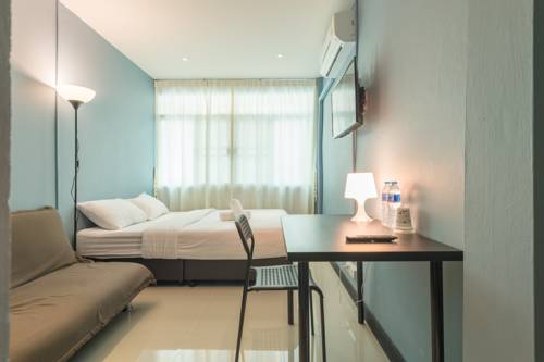 Imagen de la habitación del Hotel The Little Pig Sukhumvit. Foto 16