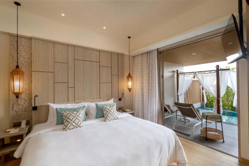 Imagen de la habitación del Hotel The Little Shore Khao Lak by Katathani. Foto 15