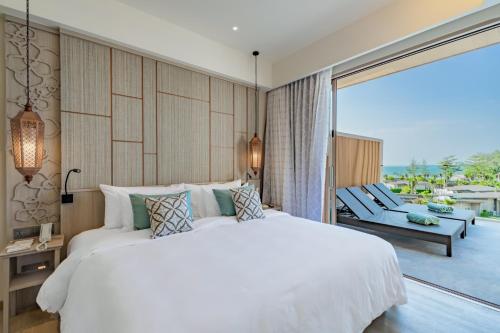 Imagen de la habitación del Hotel The Little Shore Khao Lak by Katathani. Foto 17