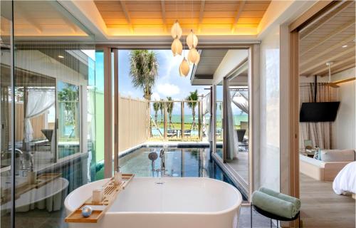 Imagen de la habitación del Hotel The Little Shore Khao Lak by Katathani. Foto 19