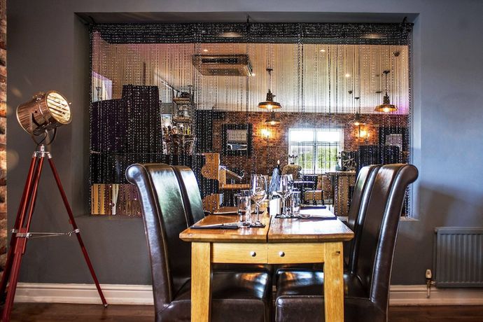 Imagen del bar/restaurante del Hotel The Littleover Lodge. Foto 7
