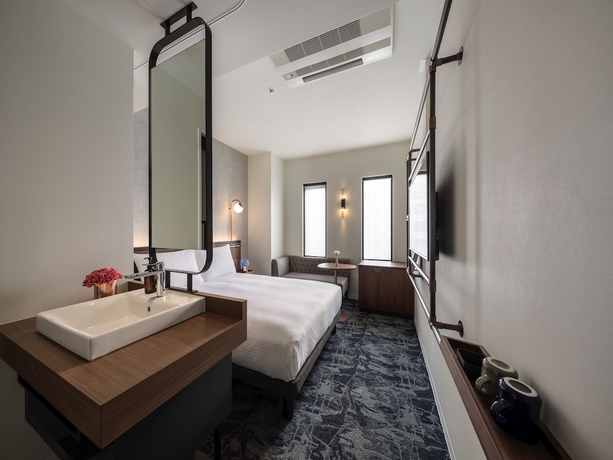 Imagen de la habitación del Hotel The Lively Osaka Honmachi. Foto 10