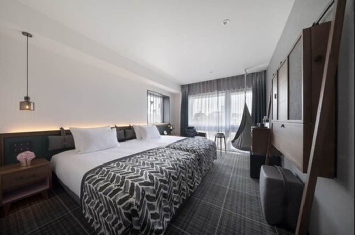 Imagen de la habitación del Hotel The Lively Tokyo Azabujuban. Foto 4