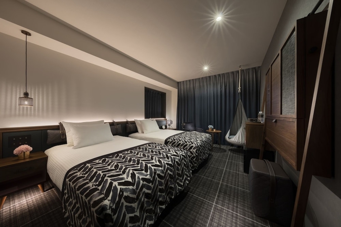 Imagen de la habitación del Hotel The Lively Tokyo Azabujuban. Foto 10