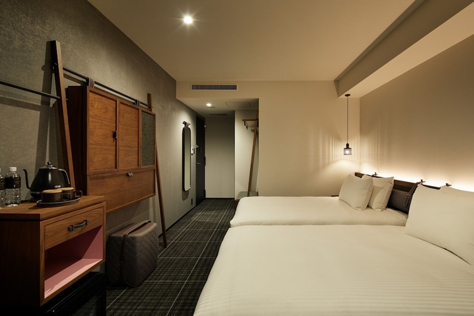 Imagen de la habitación del Hotel The Lively Tokyo Azabujuban. Foto 15