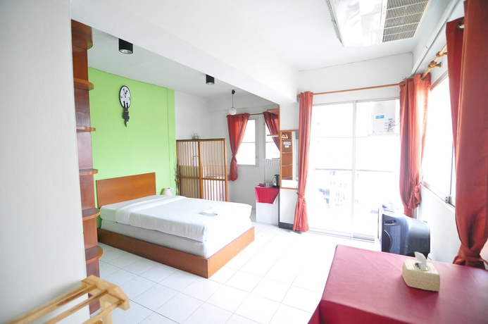Imagen de la habitación del Hotel The Living Room Serviced Apartment. Foto 2