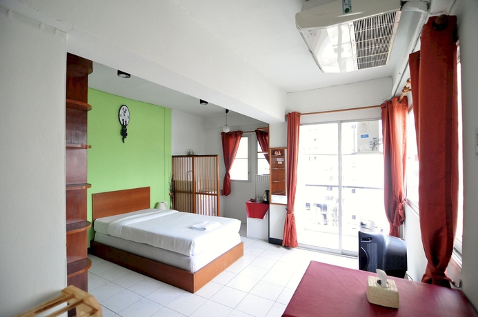 Imagen de la habitación del Hotel The Living Room Serviced Apartment. Foto 5