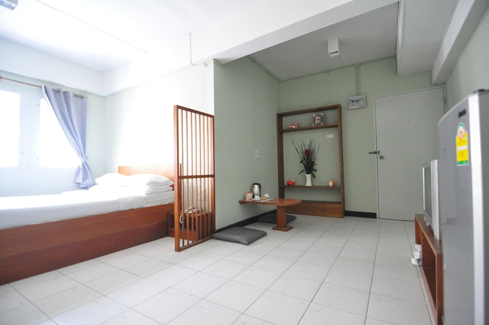 Imagen de la habitación del Hotel The Living Room Serviced Apartment. Foto 6