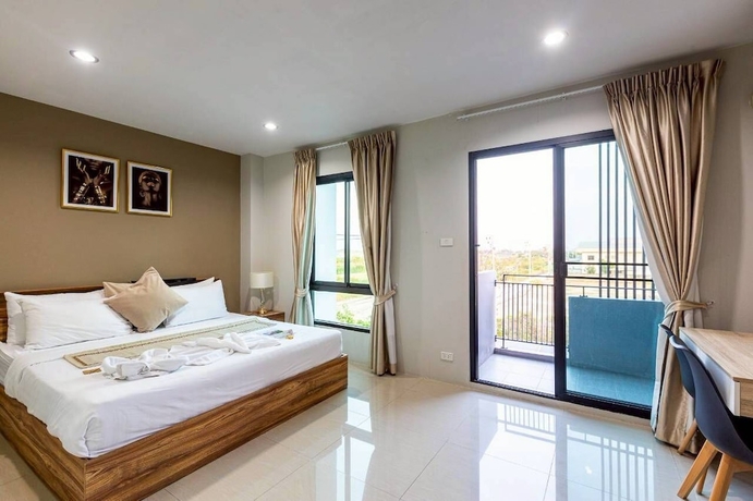 Imagen de la habitación del Hotel The Living SamutPrakan. Foto 7