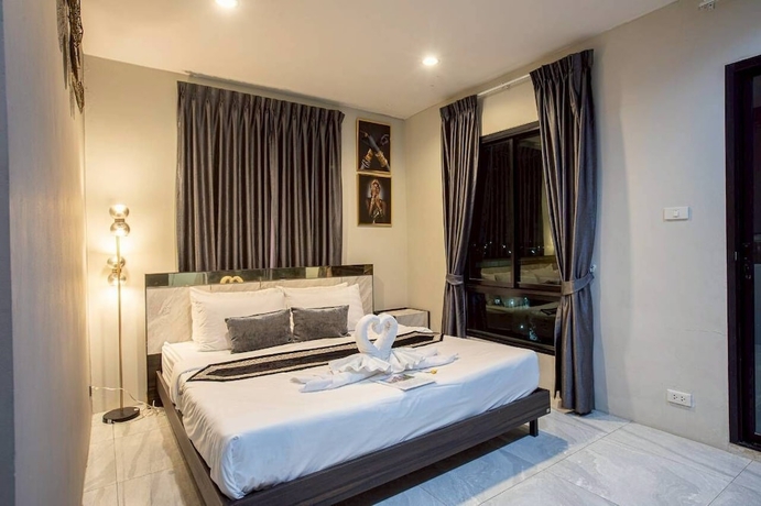 Imagen de la habitación del Hotel The Living SamutPrakan. Foto 9