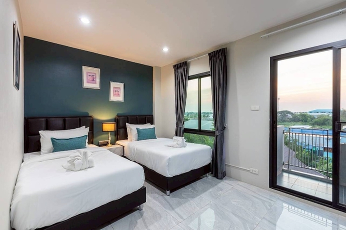 Imagen de la habitación del Hotel The Living SamutPrakan. Foto 10