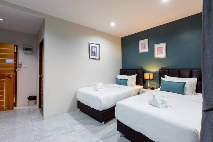 Imagen de la habitación del Hotel The Living SamutPrakan. Foto 11