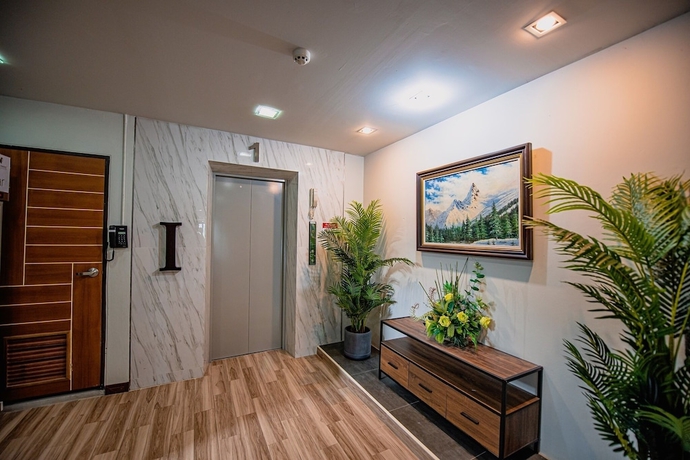 Imagen de los interiores del Hotel The Living SamutPrakan. Foto 14