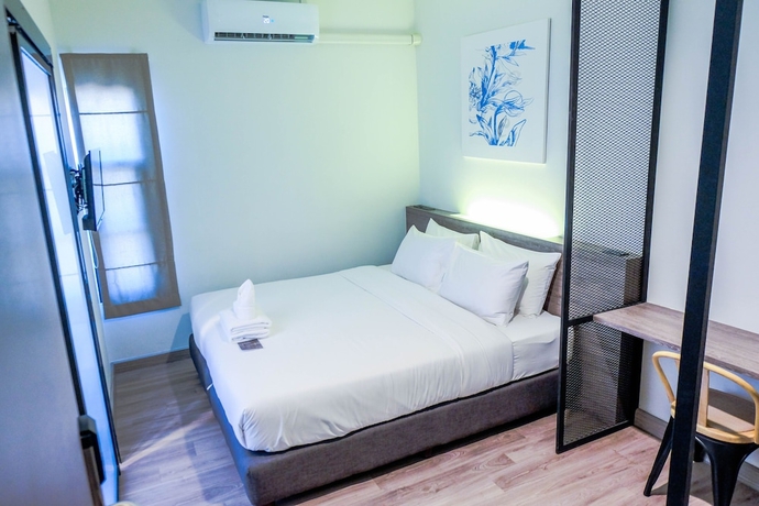 Imagen de la habitación del Hotel The Locals Chiang Mai. Foto 7