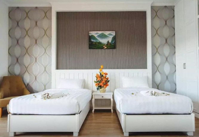 Imagen de la habitación del Hotel The Location. Foto 5