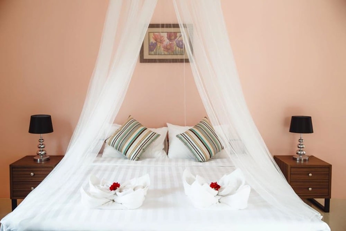 Imagen de la habitación del Hotel The Location. Foto 6