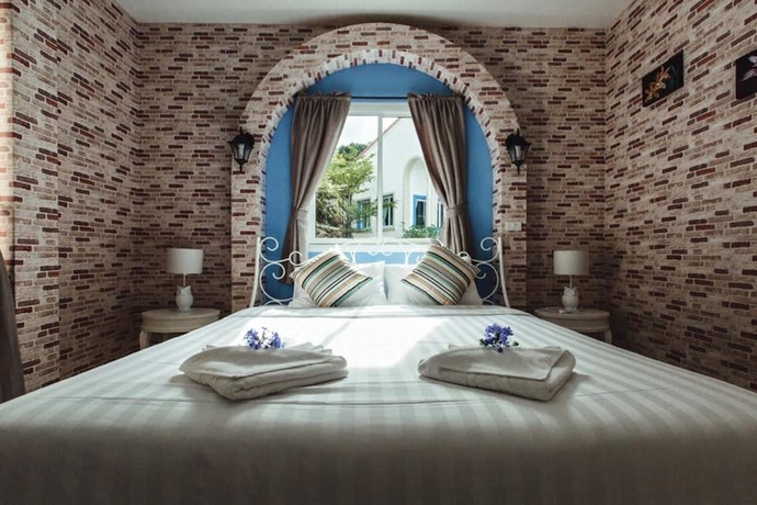 Imagen de la habitación del Hotel The Location. Foto 8