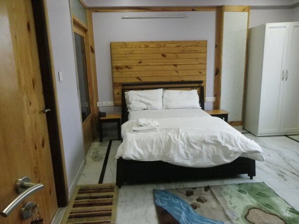 Imagen de la habitación del Hotel The Lodge B and B. Foto 15