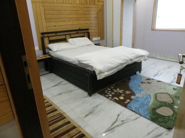 Imagen de la habitación del Hotel The Lodge B and B. Foto 20