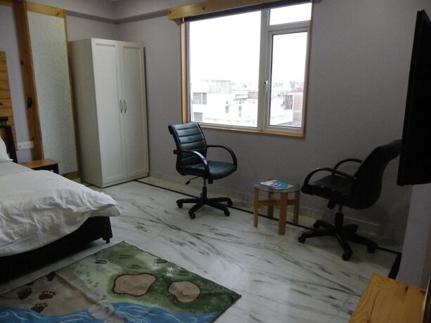 Imagen de la habitación del Hotel The Lodge B and B. Foto 21
