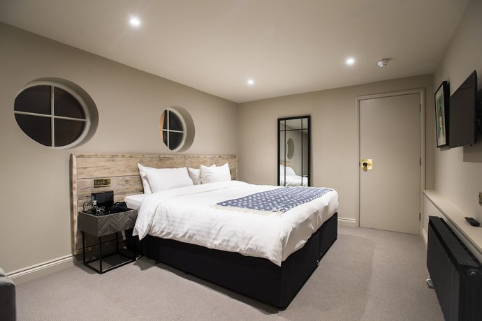 Imagen de la habitación del Hotel The Lodge Duxford. Foto 11
