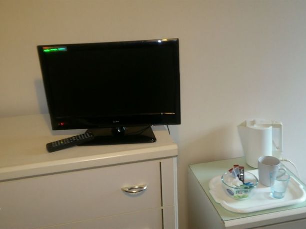 Imagen de la habitación del Hotel The Lodge Guesthouse. Foto 8