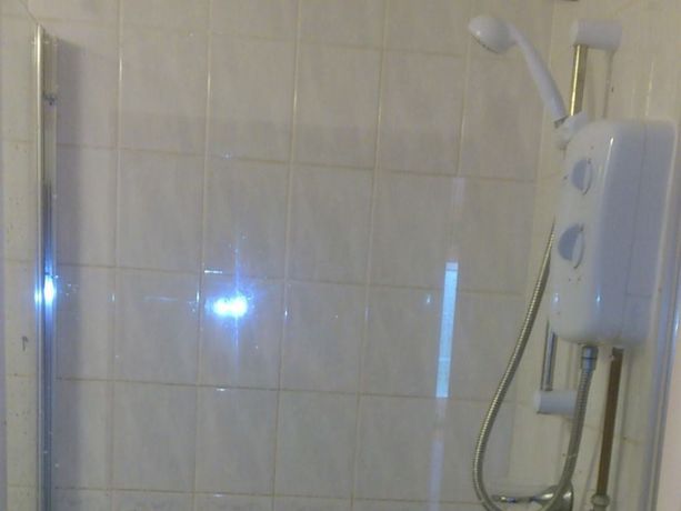 Imagen de la habitación del Hotel The Lodge Guesthouse. Foto 10