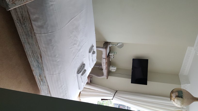 Imagen de la habitación del Hotel The Lodge, Harrogate. Foto 11