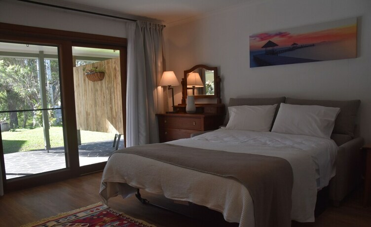 Imagen de la habitación del Hotel The Lodge Mapleton Falls. Foto 2