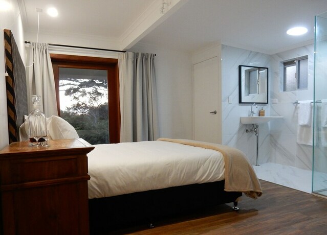 Imagen de la habitación del Hotel The Lodge Mapleton Falls. Foto 17