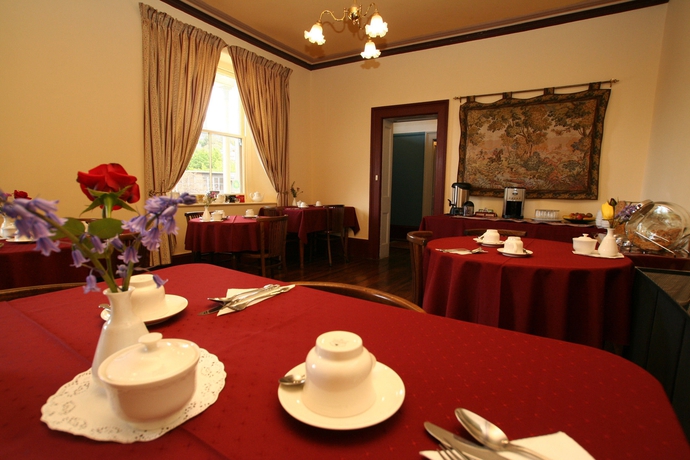 Imagen del bar/restaurante del Hotel The Lodge On Elizabeth. Foto 4
