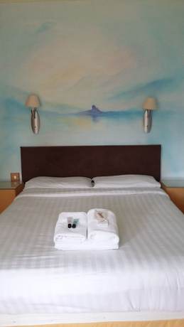 Imagen de la habitación del Hotel The Lodge On The Loch. Foto 6