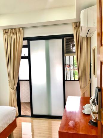 Imagen de la habitación del Hotel The Lodge Pattaya. Foto 3
