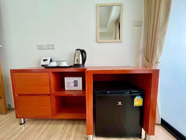 Imagen de la habitación del Hotel The Lodge Pattaya. Foto 7