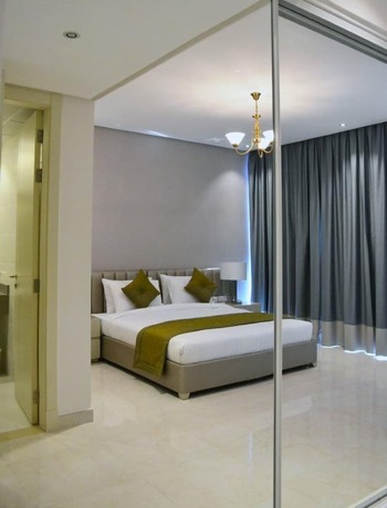 Imagen de la habitación del Hotel The Lodge Suites. Foto 17