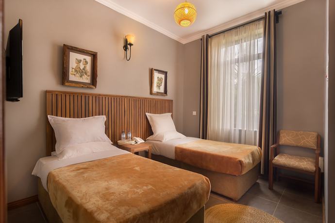 Imagen de la habitación del Hotel The Lodge Tellamande. Foto 10