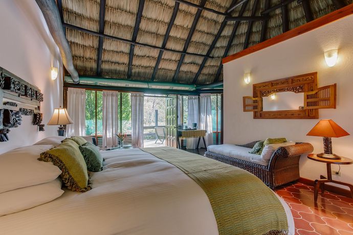 Imagen de la habitación del Hotel The Lodge at Chaa Creek. Foto 9