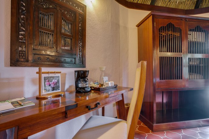 Imagen de la habitación del Hotel The Lodge at Chaa Creek. Foto 12